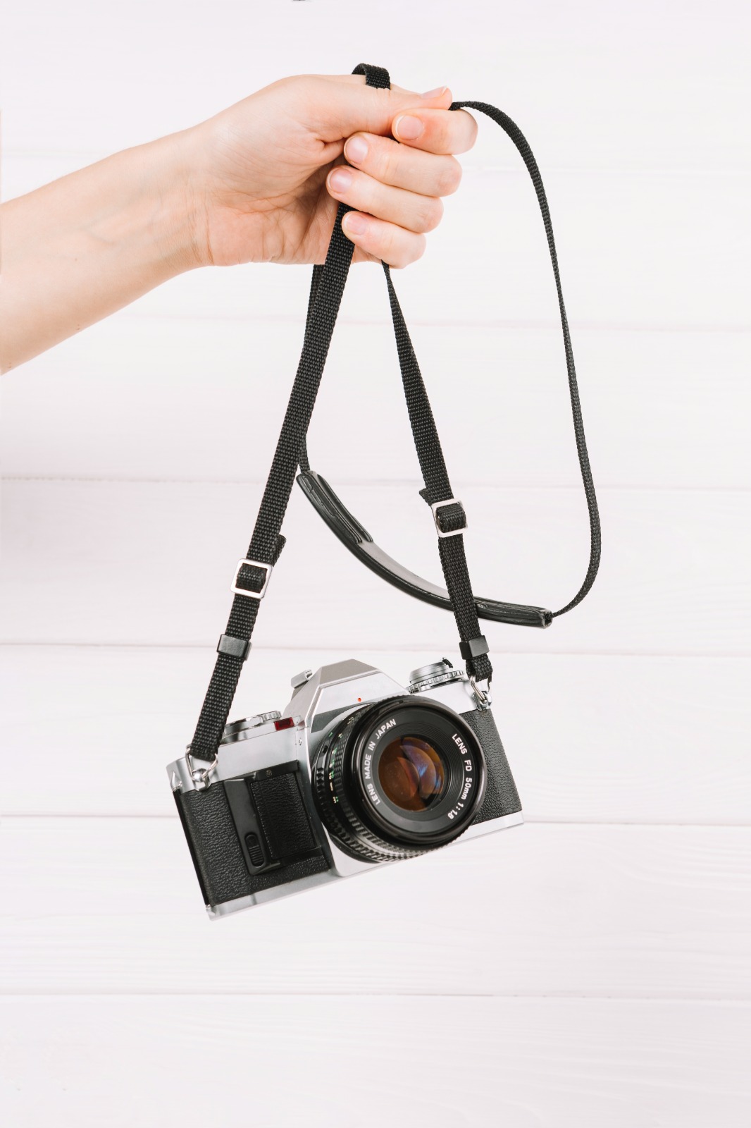 young woman who owns a camera or smartphone.